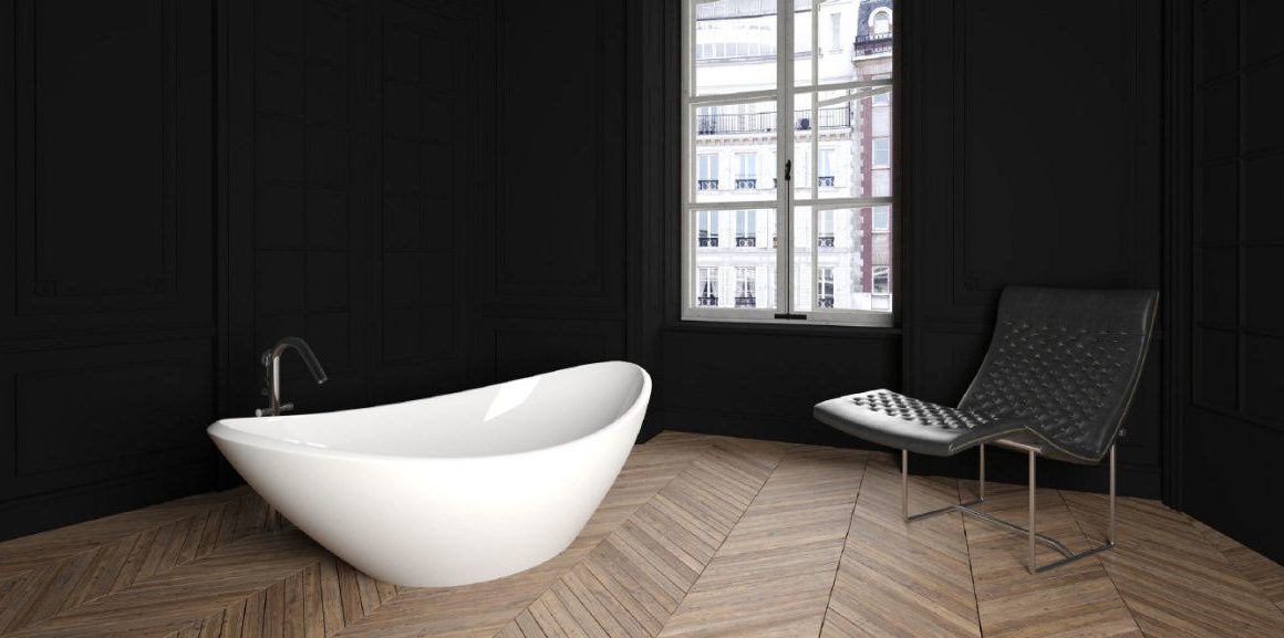 Oak floor installed in chevron pattern, white modern bathtub and all around black/brown painted walls