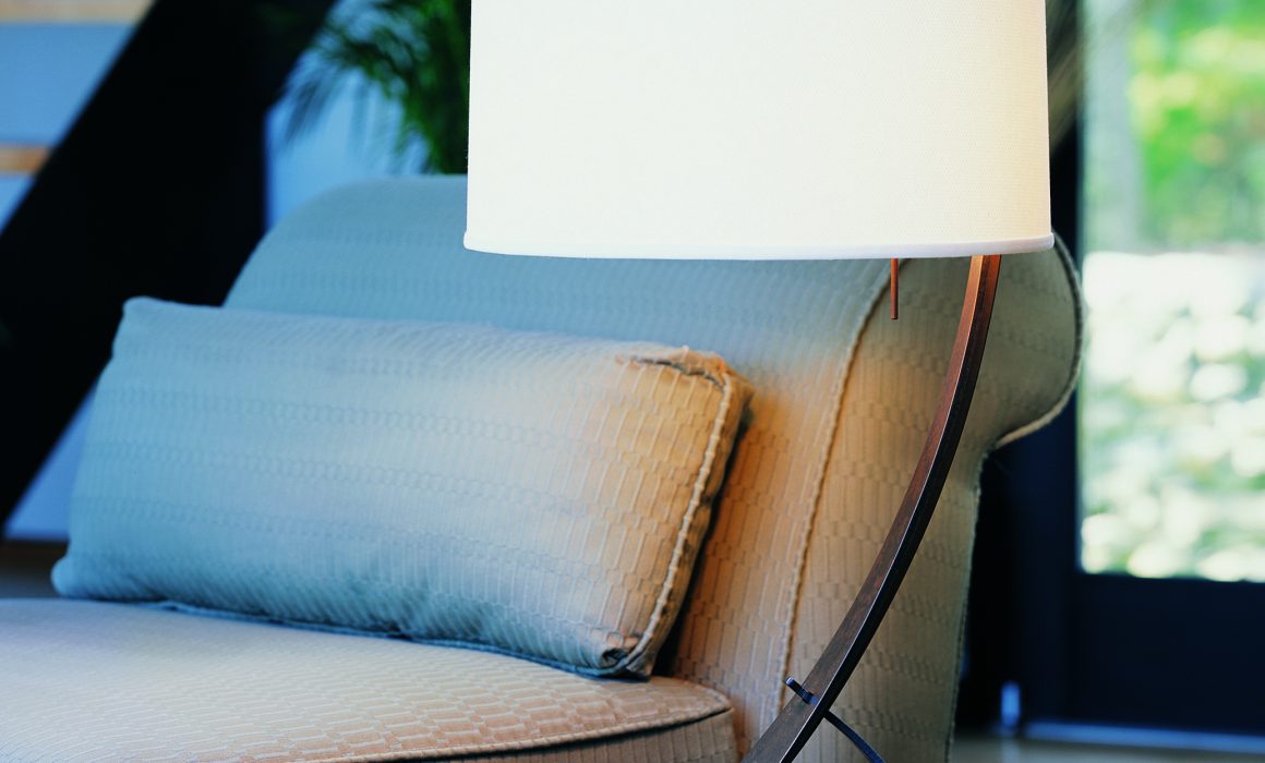 Modern table lamp, brown curved base and white cream shade